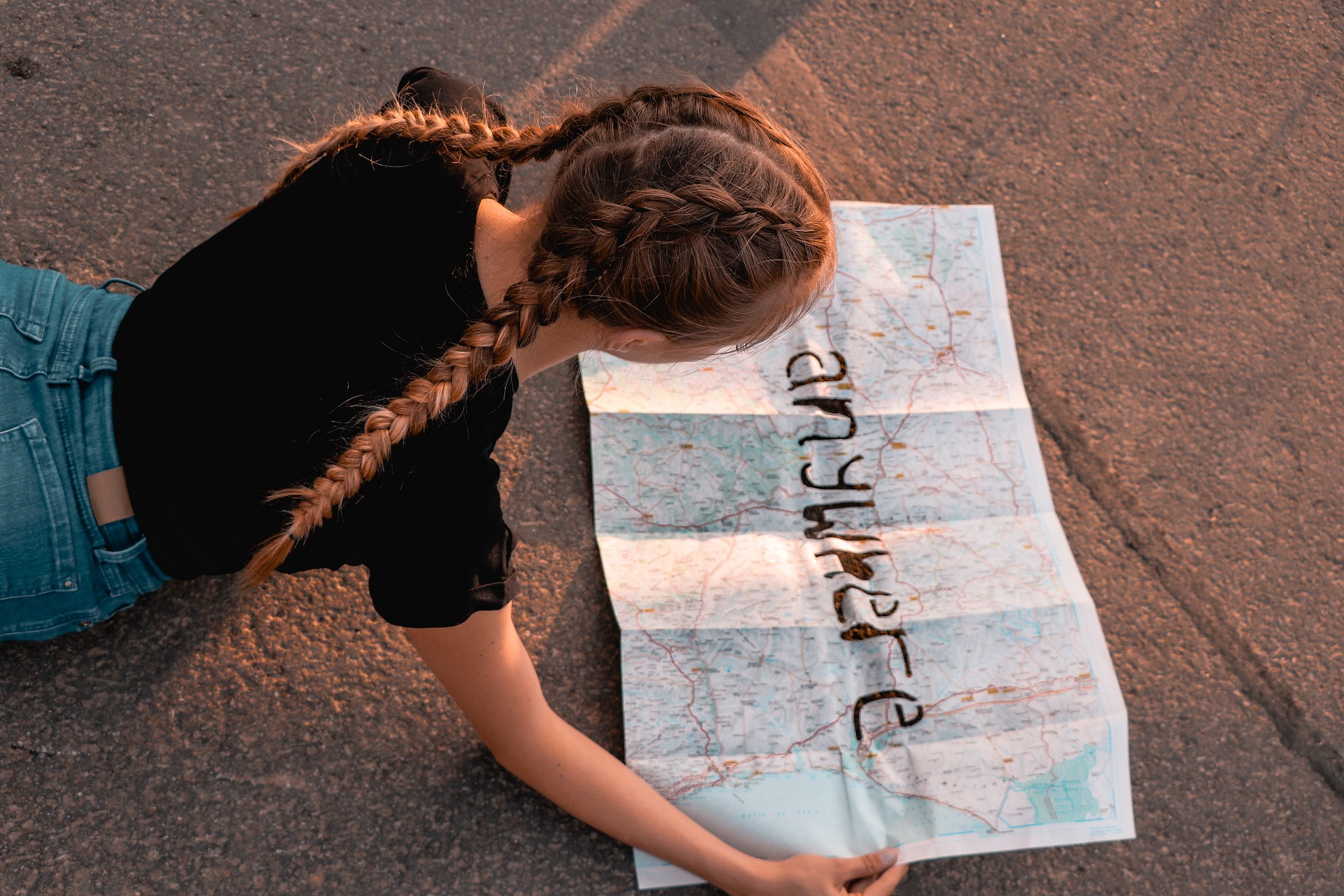 girl looking at a map
